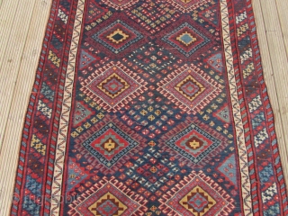 Good Antique Lori South West Persian Long rug. Good pile and great colours. 9 ft 9 inches x 5 ft 2 1/2 inches. 297 x 159 cm. SOLD     