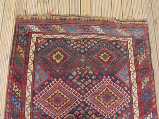 Good Antique Lori South West Persian Long rug. Good pile and great colours. 9 ft 9 inches x 5 ft 2 1/2 inches. 297 x 159 cm. SOLD     