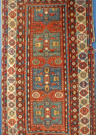 Antique Caucasian Rug, possibly a Chyly(?)
Has great overall pile but also has a few problems.  The ends need work and there is a large ding along the one edge.
There are also  ...