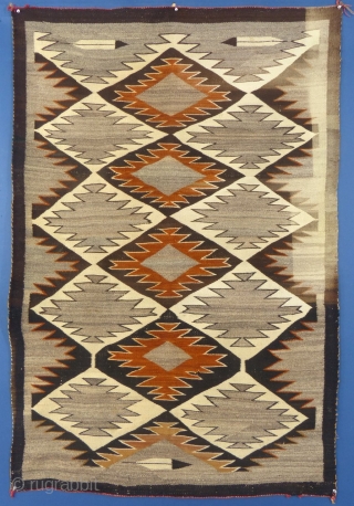 Navajo Regional Weaving, c. 1915-25, 66" X 44", Very Good Condition but it does have t stains on the good side and fade on the other side (see pictures)

PLEASE EMAIL ME DIRECTLY  ...