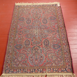 This is an antique Sarouk.
It is all wool with a cotton foundation.
It dates from c.1900-1920.
It is in excellent condition with full pile 
The fringe is not original.
This rug measures 57" X 40".

SOLD 