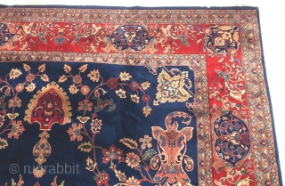 THIS IS A BEAUTIFUL PERSIAN KASHAN c.1940's.
Medium low lush dense silky wool pile on cotton foundation.
Very finely hand-knotted.
The field has multicolor palmette floral designs on navy blue background.
 Corner guards and borders  ...
