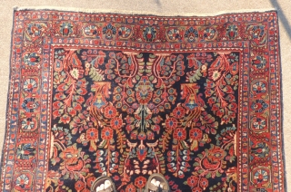 Antique Sarouk Carpet, ca. 1930's
4'3" x 7'
Medium low dense wool pile on cotton foundation. 
Field with central multicolor medallion and floral palmettes designs on navy blue background;
Borders with floral motifs on blue  ...