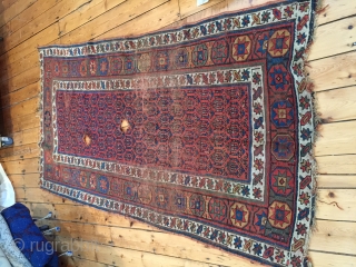 4'2" x 7'8" Kurdish two holes and worn rug / fragment. As-found, no touch ups, appears to be fairly clean.             