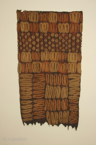 Africa: woman's tubular garment of resist dyed rafia fiber, each side 20 x 30 inches (51 x 100cm) Dida tribe, Ivory Coast, circa 1900, with some wear and losses.    