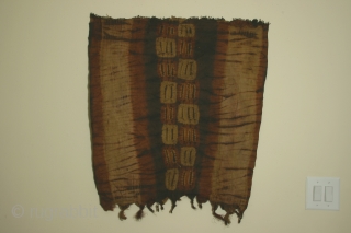 Africa: woman's tubular garment of resist dyed rafia fiber, each side 29 x 33 inches (74 x 84cm), Dida tribe, Ivory Coast, circa 1900, with some wear and losses.    