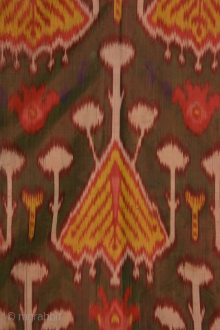 Uzbek woman's dress with resist dyed silk warps and red silk wefts. Dimensions: 69 inches across the shoulder and 50 inches high (175 x 127cm), late 19th century. Uzbek ikat dresses are  ...