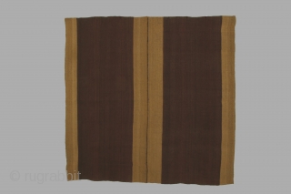 Bolivian mantle (nanaka) with bands of undyed vicuna colored alpaca wool on a ground of purple dyed sheep's wool, 40 x 41 inches (102 x 104cm), circa 1900-1950. The use of alpaca  ...