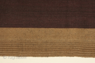Bolivian mantle (nanaka) with bands of undyed vicuna colored alpaca wool on a ground of purple dyed sheep's wool, 40 x 41 inches (102 x 104cm), circa 1900-1950. The use of alpaca  ...