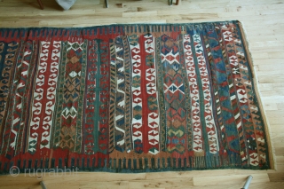 Anatolian kilim,Yuncu tribes, Balikesir region, circa 1800-1850, 51 x 116 inches (130 x 295cm) with a rare multiband design, professionally cleaned with minor restorations throughout the kilim.      