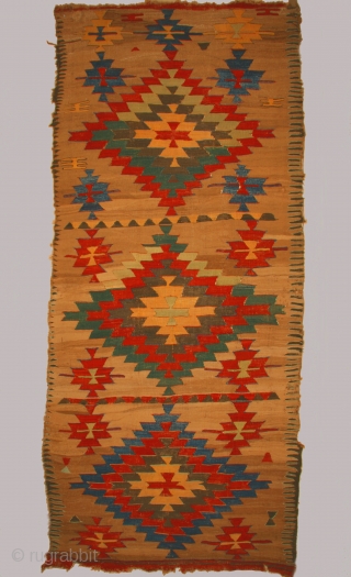 Anatolian kilim with 3 "baklava" type large medallions on a camel hair field, 145 x 340cm, mid-19th century               