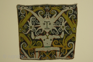 Panel attached to a baby carrier, Iban tribe Borneo, glass beads and cotton, 19th century, 12 x 13 inches              