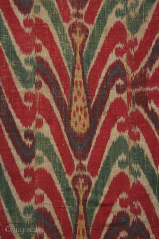 Uzbek ikat wallhanging, silk warp, cotton weft, 19th century, 46 x 58 inches, lining of hand spun hand woven cotton with a stamped or resist dyed design. The many fabric pieces comprising  ...