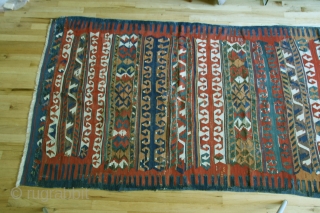 Anatolian kilim, circa 1800, 52 x 114 inches. A rare type of Yuncu multibanded kilim.Cleaned, with minor restorations throughout kilim             