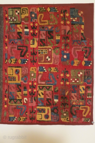 Pre-Columbian panel, Peru, post Wari culture, circa 900-1000 AD, with a whhie cotton plain weave ground with supplemental wool patterning depicting 6 zoomorphic figures. The figures probably represent shaman undergoing transformation, with  ...