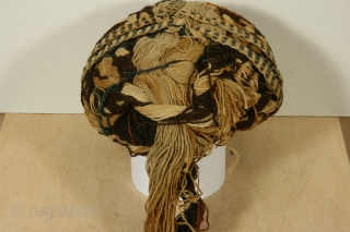 Pre-Columbian woven and plaited turban of alpaca wool, early Arica culture, Chile, circa 1000BC-0 AD, 9 inches across and 4 inches high. In excellent condition without any stains or losses. The turban  ...