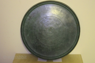 Cambodian bronze tray, Khymer, Ankor period, Baphuan style, circa 12-13th century, 13 inches in diameter, 1 1/2 inches high, probably made for temple offerings. In excellent condition with a fine even overall  ...