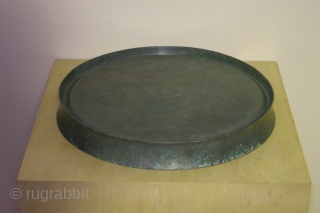 Cambodian bronze tray, Khymer, Ankor period, Baphuan style, circa 12-13th century, 13 inches in diameter, 1 1/2 inches high, probably made for temple offerings. In excellent condition with a fine even overall  ...