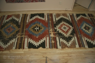 Anatolian kilim, 4 band double niche saf style, circa 1800-1850, approximately 5 x 12 feet. An uncommon saf style.              