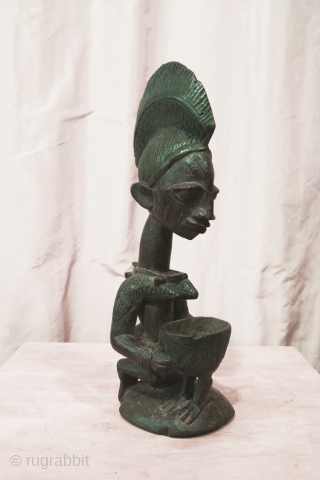 Yoruba female figure, Nigeria, wood, 14 inches high, mid 20thc.,Ex Irwin Hersey col.                    