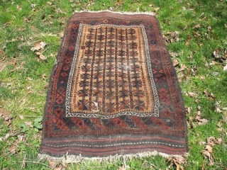 Camel Ground Baluch Rug w/Maimanna border

Size 38 1/2" x 65 1/2" at greatest dimensions
End treatment Upper kilim end 41/2 ", lower kilim end 5 1/2"

A few tassels remain on the upper right  ...