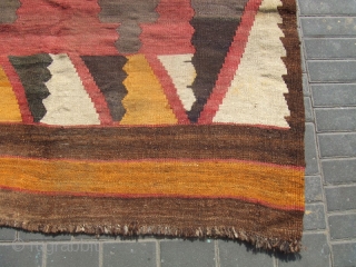 Afghan kilim made with wool on wool .
The kilim enjoyed beautiful colors and patterns The kilim has been fixed in some places(as you can see on the pictures)Condition: good (minor stains) 
Size:  ...