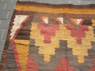 Afghan kilim made with wool on wool .
The kilim enjoyed beautiful colors and patterns The kilim has been fixed in some places(as you can see on the pictures)Condition: good (minor stains) 
Size:  ...