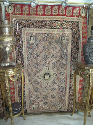 Exceptional Persian Qajar Resht Panel, the wool ground with cut work wool pieces appliqué with silk embroidery and silver warp in sun ray. The faces are probably those of princesses. Third quarter  ...