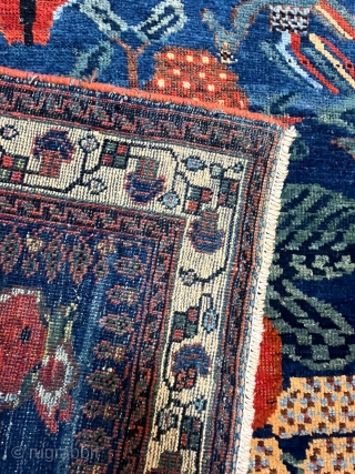 AFSHAR HANDMADE 
SIZE:180*125
AGE:18 TH 
MATERIAL:WOL
a collection of antique carpets on the sit                     