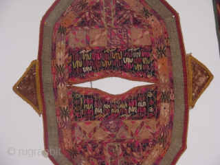 This turkmen child kirlik is an hand stitched silk on cotton in a fair condition
the wear on some spots shows that it was used by a very active child for a long  ...