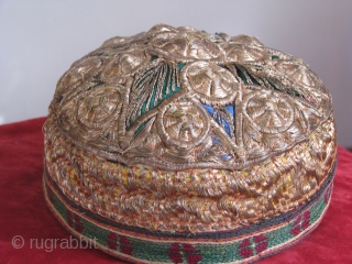 This zardozi hat is from Badakhshan northern Afghanistan and it's tajik tribe.It is called,  
*zardozi because the metallic threads are usually bin wrapped with real gold or silver in the very  ...