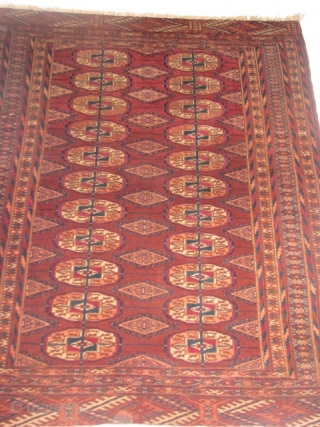 This is a fine turkmen rug with all natural colors. It is in a very good condition all over and full pile; no repair and nothing missing.      