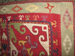 Interesting laqi suzani wool on wool square piece not turn of century old but nice enough to decorate a corner with it.           