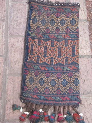 This is the only spindle bag that I have ever seen in this tribe(imaq),a nice old flat weave oaq bash with good colors          
