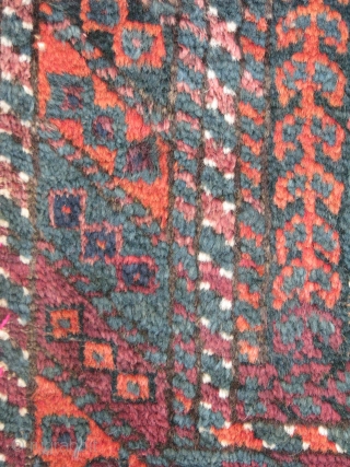 Here is an old baluch balisht with nice blue green background very soft silky wool all natural colors,it still has the backing           