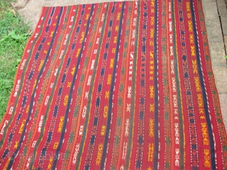 This is an old ghadjari flat weave with all natural colors and its in a good condition                