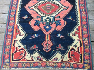 Antique Bijar Kilim Rug 3.5 Ft. x 5.25 Ft.
A dynamic design with a great color combination makes the center medallion seem to float in mid-air. This rug has a magnetic quality. The  ...