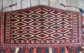 Antique Yomut Asmalyk -Large Size (124 cm by 64 cm[approx. 49" by 25"]-not counting tassels)
This five-sided Turkoman bridal trapping is truly a collector's item with real investment value. A rarity in the  ...