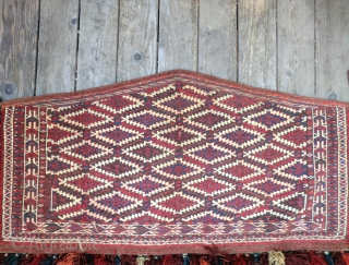 Antique Yomut Asmalyk -Large Size (124 cm by 64 cm[approx. 49" by 25"]-not counting tassels)
This five-sided Turkoman bridal trapping is truly a collector's item with real investment value. A rarity in the  ...