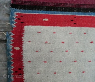 Antique Mexican Serape -Wool on Linen -74" by 38" This is a Saltillo style serape where the diamond center is an aggregate of four diamonds on a spot-repeat field with zigzag borders.
The  ...