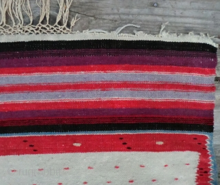 Antique Mexican Serape -Wool on Linen -74" by 38" This is a Saltillo style serape where the diamond center is an aggregate of four diamonds on a spot-repeat field with zigzag borders.
The  ...