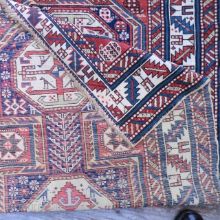 19th Century Caucasian Rug -Dagestan? 3.5 ft. by 5.5 ft.
Classic 3 medallion design. All original, very low pile, small areas of exposed foundation, missing end borders (see photos 3 and 4).  