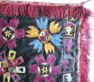 Antique Uzbek lakai Ilgitsh Embroidery -29" by 32" (Not Counting Fringe)
Blanket stitch and chain stitch silk embroidery on black cotton twill and twisted silk fringe with a silk ikat backing- all original  ...