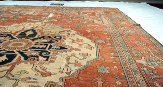 9x12 1870's Serapi, worn.  No dry areas - the carpet is completely malleable.  http://www.dilmaghani.com                 