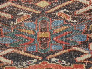 3.6x8 early kurdish rug 
it appears that it has a rewoven ends and sides                   