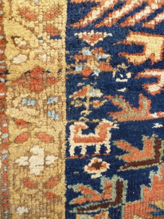 North West Persian Runner. Fragmented: missing outer border section, heat related damage in same area. Otherwise full pile with minimal damage. Good colours and interesting anthropomorphic motifs - see photos. Needs a  ...