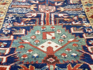 North West Persian Runner. Fragmented: missing outer border section, heat related damage in same area. Otherwise full pile with minimal damage. Good colours and interesting anthropomorphic motifs - see photos. Needs a  ...