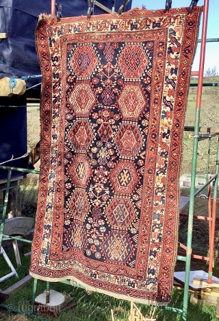 Hamadan rug with Kurdish influences. 225cm x 130cm One or two low pile areas. Sides and ends will be secured. No restoration or repairs. Pure wool. Rug lies flat, regular dimensions.  
