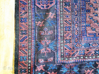 Massive Timuri Baluch carpet, the panelled field with geometric medallions and designs, enclosed by a shaded geometric border with wide flat-weave ends. Pure wool. Finely woven. Age: circa 1900, or before. Size:  ...
