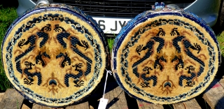 A pair of antique Chinese pile-woven covered marriage stools, old Ningxia covers on later painted wooden frames. Size of covers: 15 inches diameter or 37.5 cm Final photo shows how such stools  ...